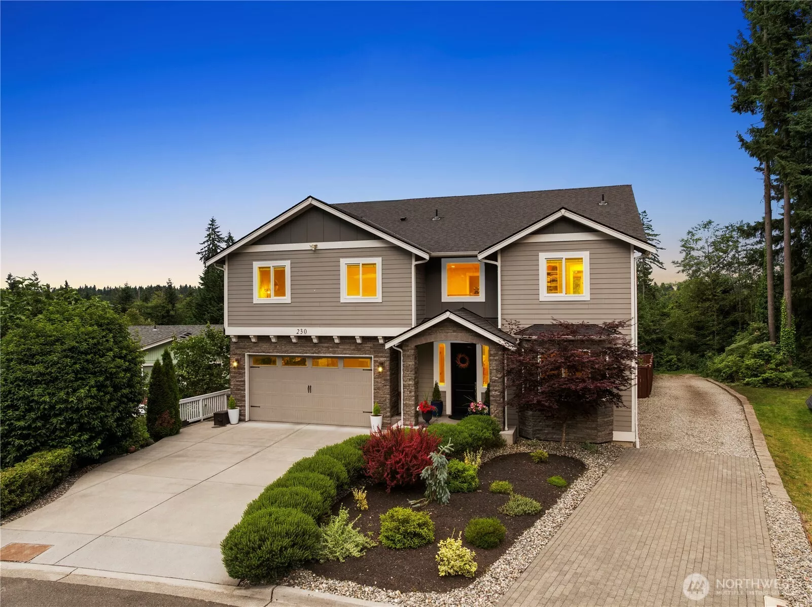 Welcome this custom built home near Martha Lake!