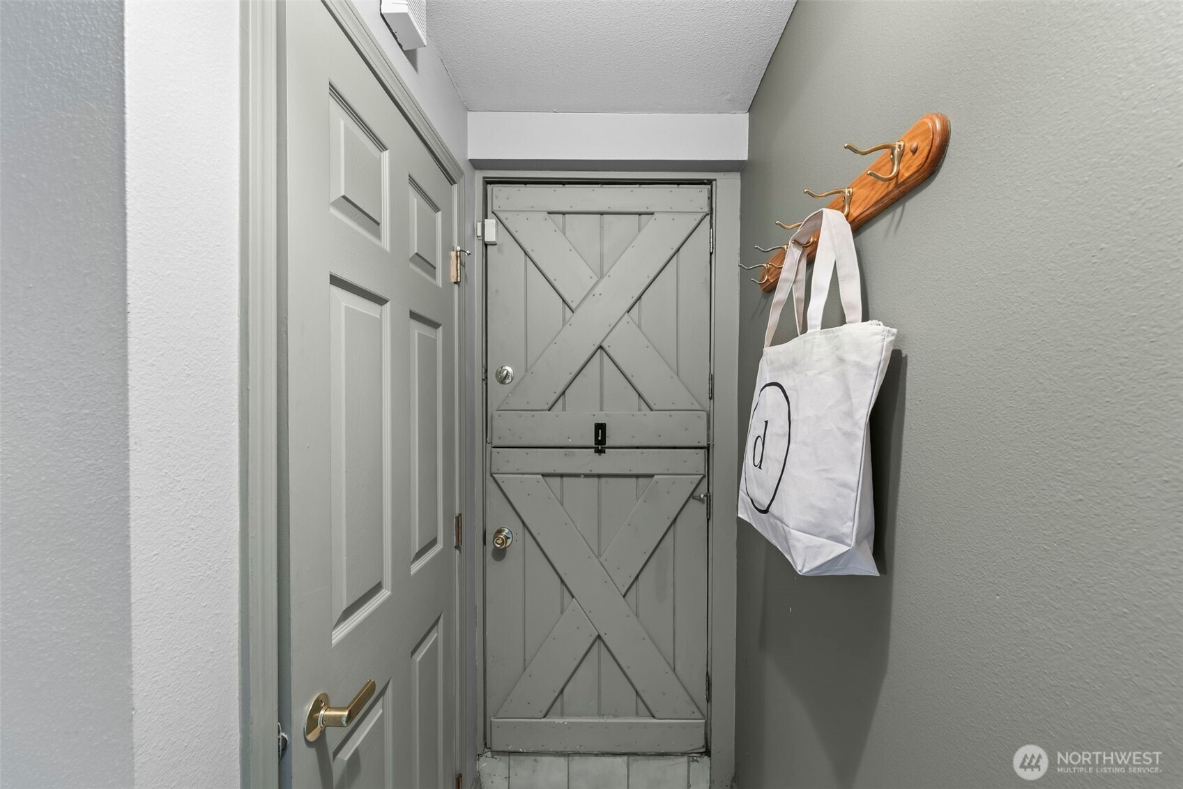This vintage, completely charming Dutch Door acts as the separate entry off the courtyard to the basement suite!