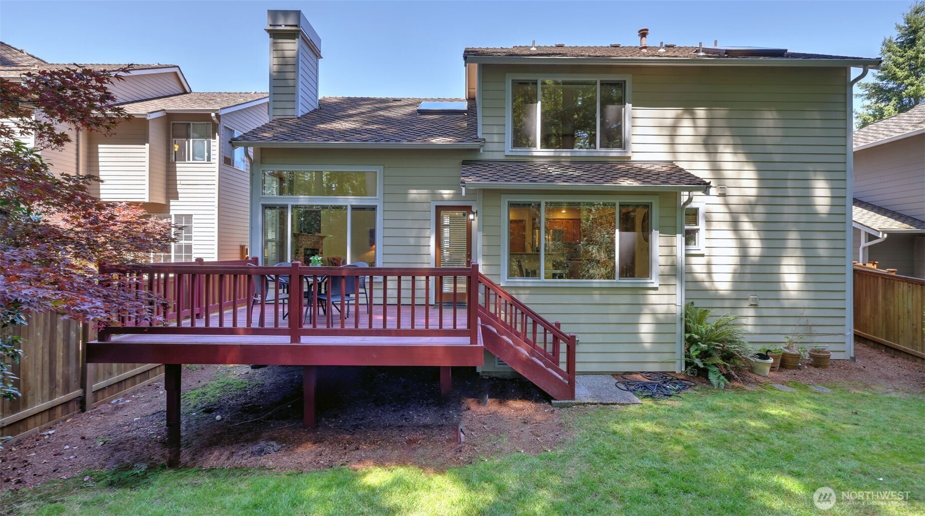 From the back of the house there is a nice sized deck perfect for meals, parties and just relaxing looking into the forest that surrounds Yellow Lake.