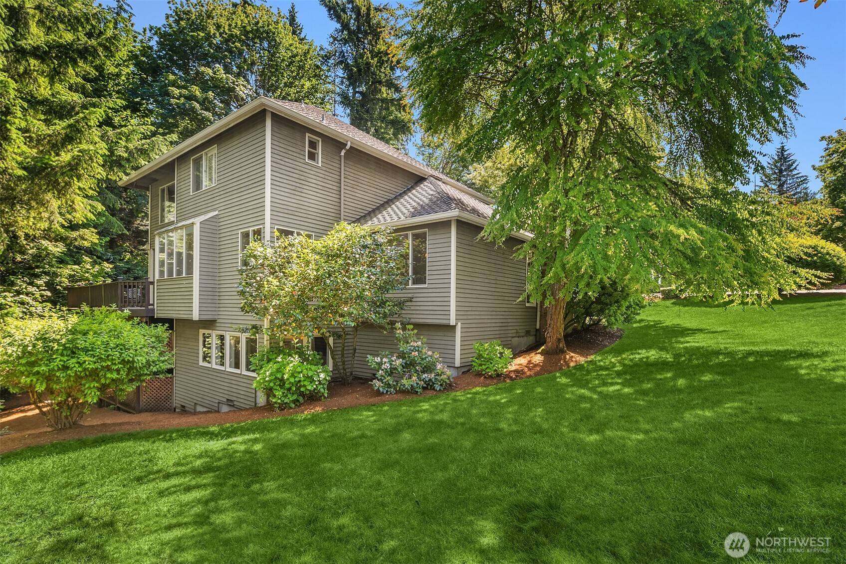 Set on a 1/3 acre corner lot, the yard is ideal for pets, play and entertaining.