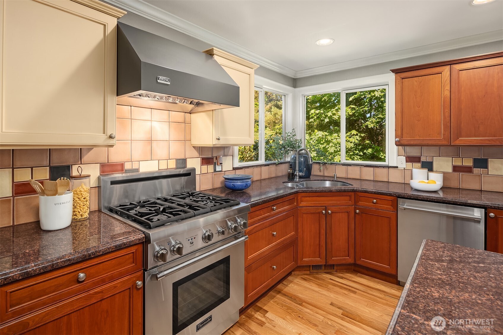 Newer Viking and Thermador appliances, lots of countertop space for food prep and plenty of cabinets for storage