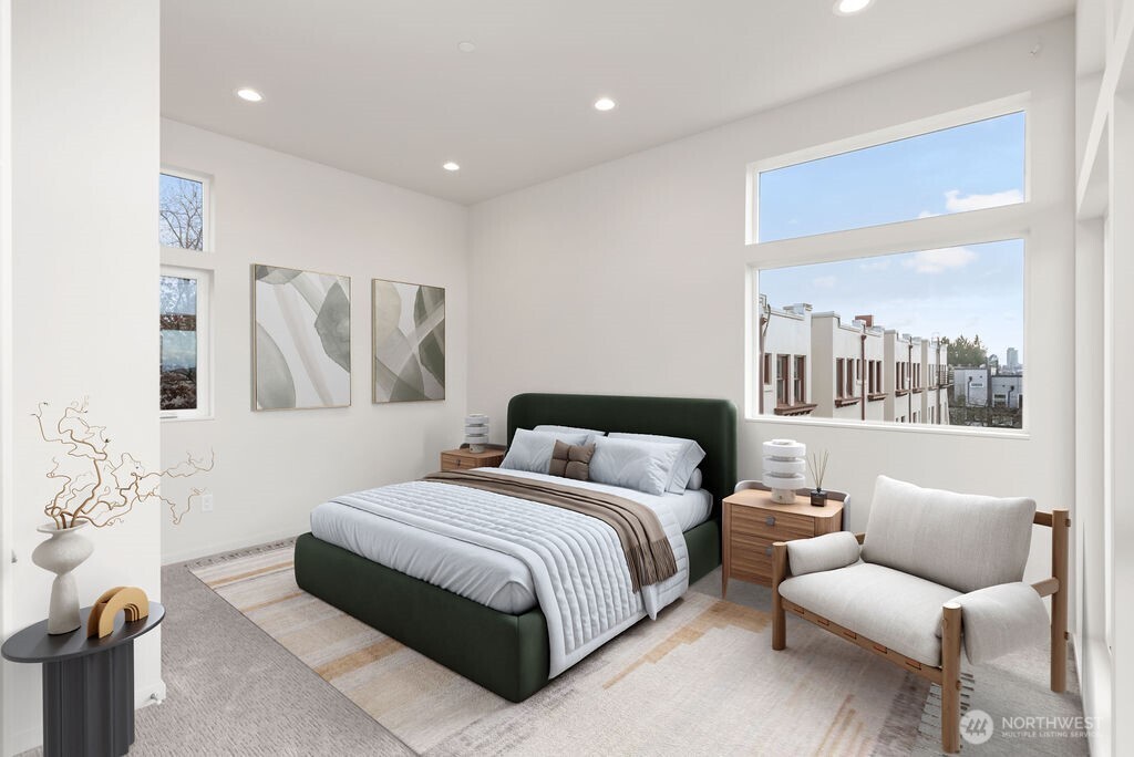 4th floor primary suite. Virtually staged-pic is of similar unit