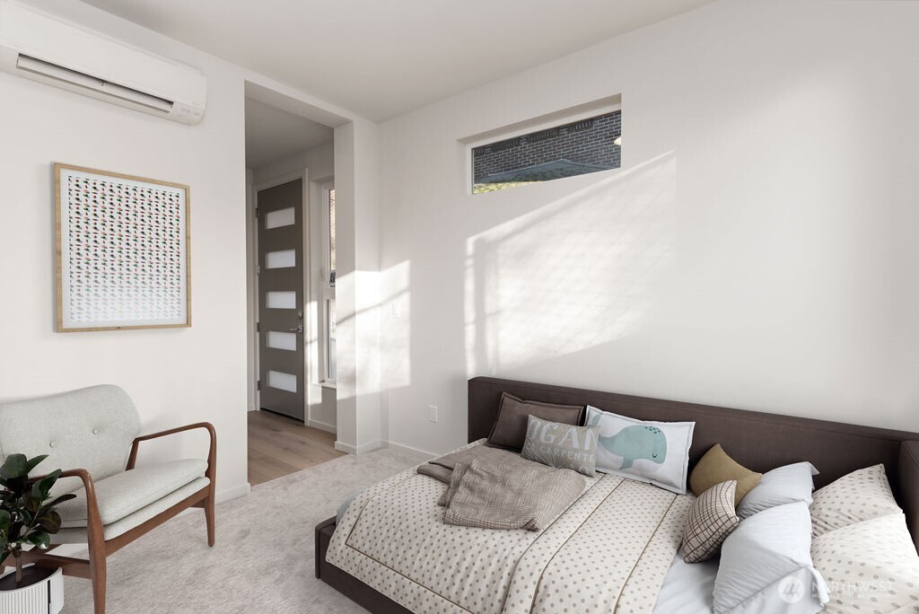 Main floor ADU Bedroom/office. -Virtually staged-pic is of similar unit