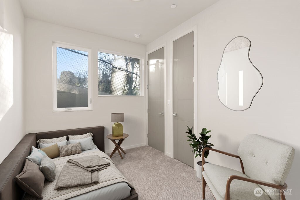 Main floor ADU Bedroom/office. Virtually staged-pic is of similar unit