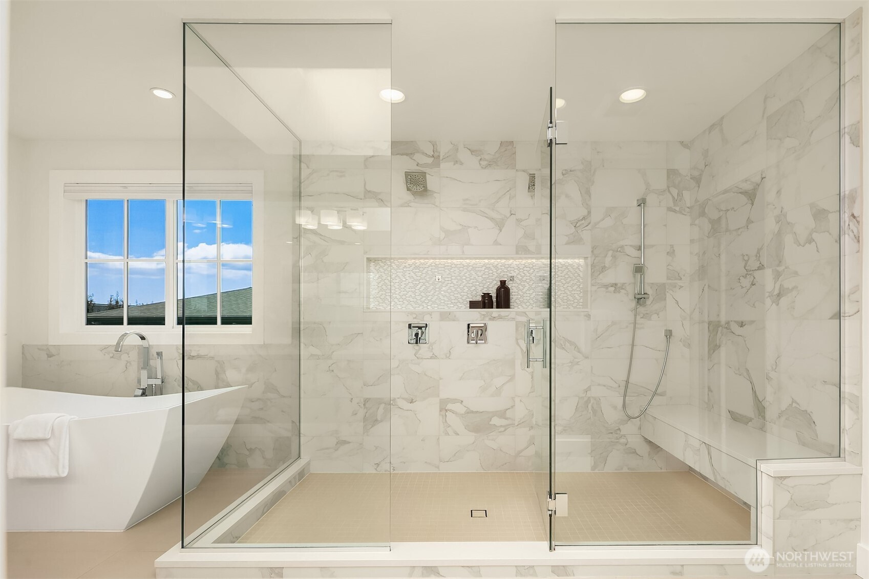 Sumptuous freestanding tub & extra-large walk-in shower.