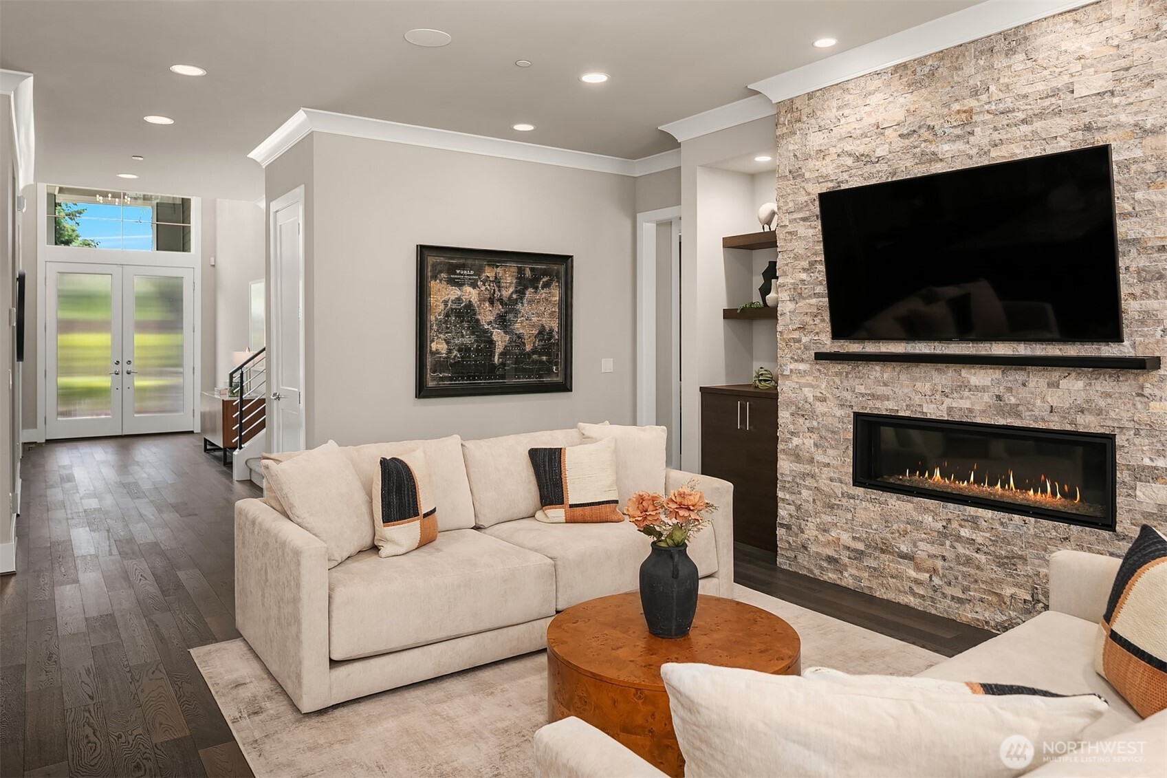 Genuine hardwoods flow to the great room, accented by elegant crown molding & extra-tall baseboards.