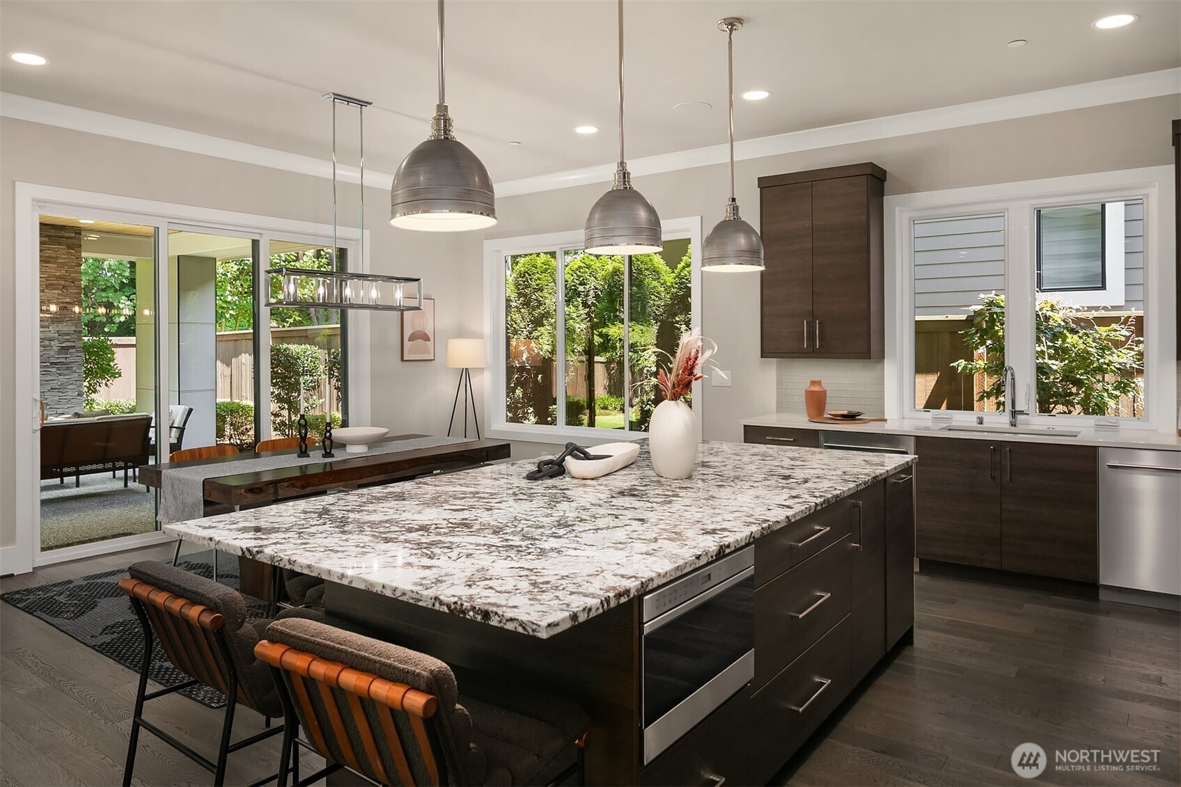 Open, social layout keeps the chef connected to the dining & living areas.