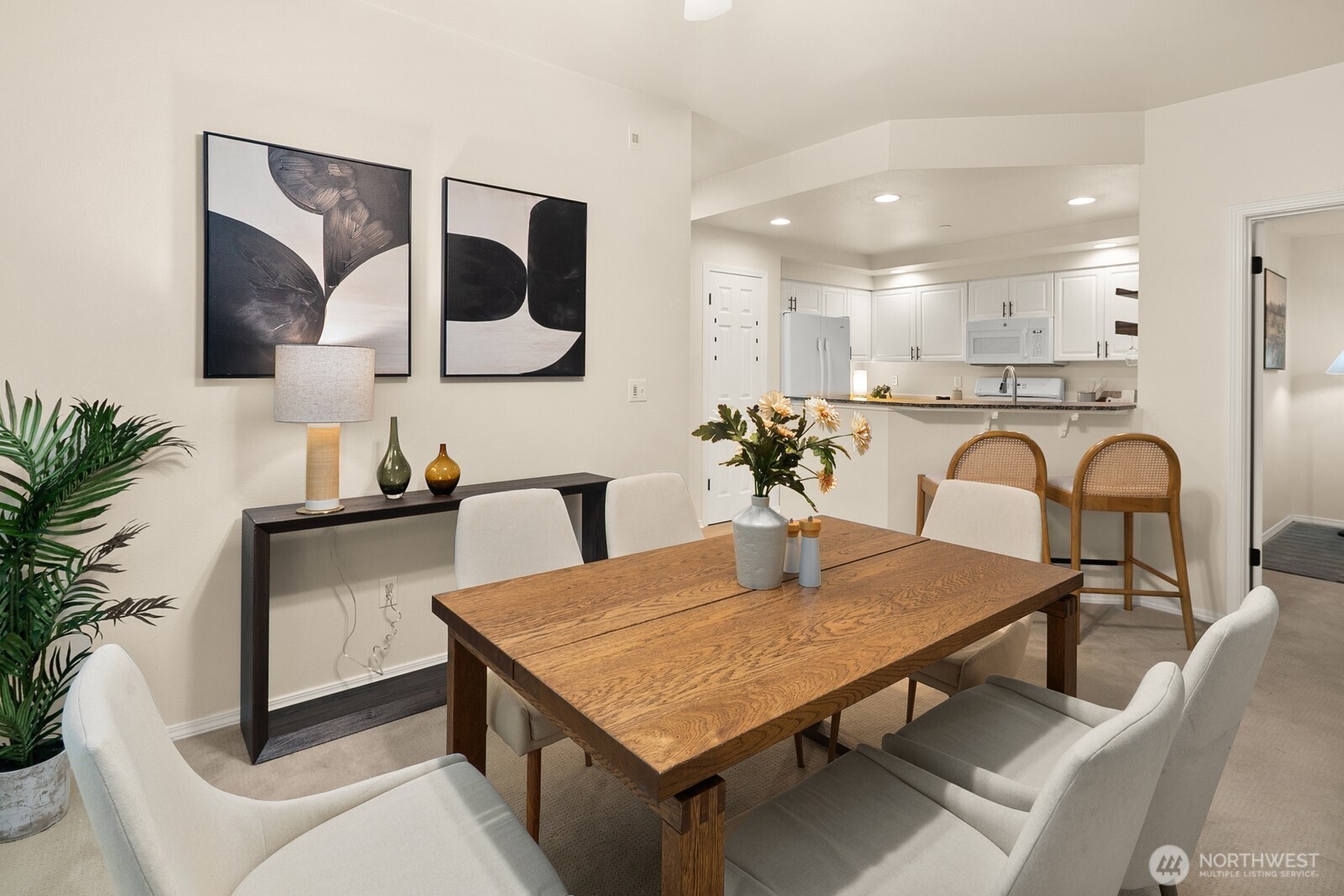 Open living room, dining room, kitchen- opening to private back patio & yard space