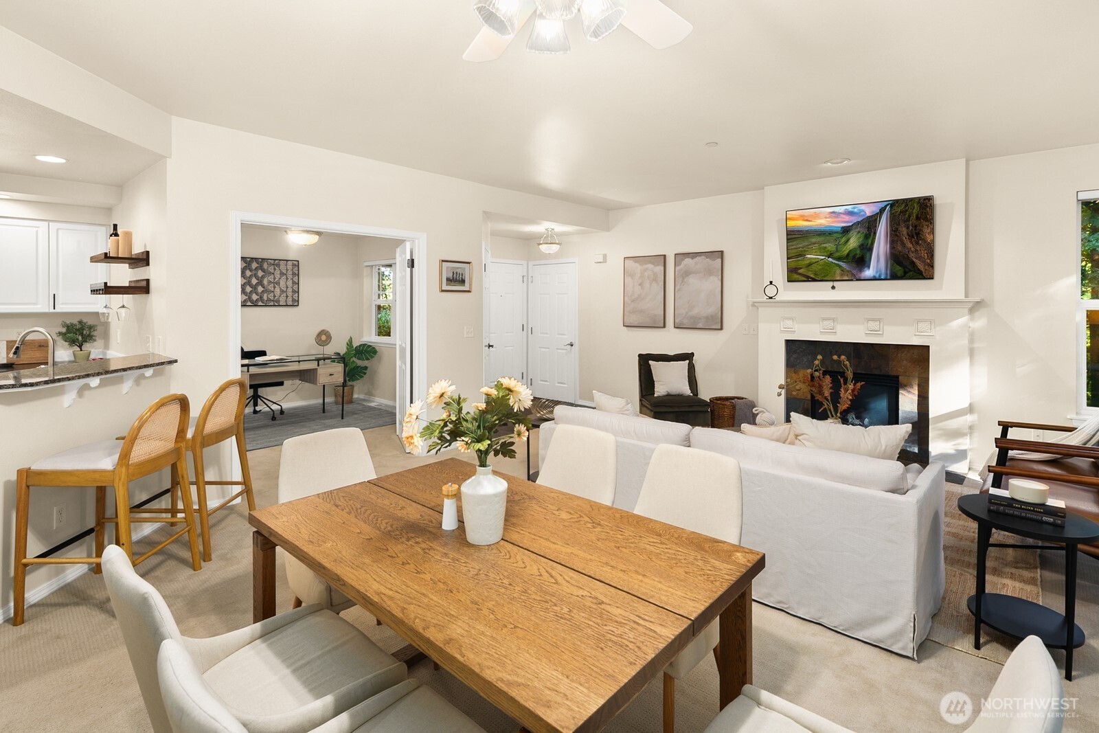 Open living room, dining room, kitchen- opening to private back patio & yard space