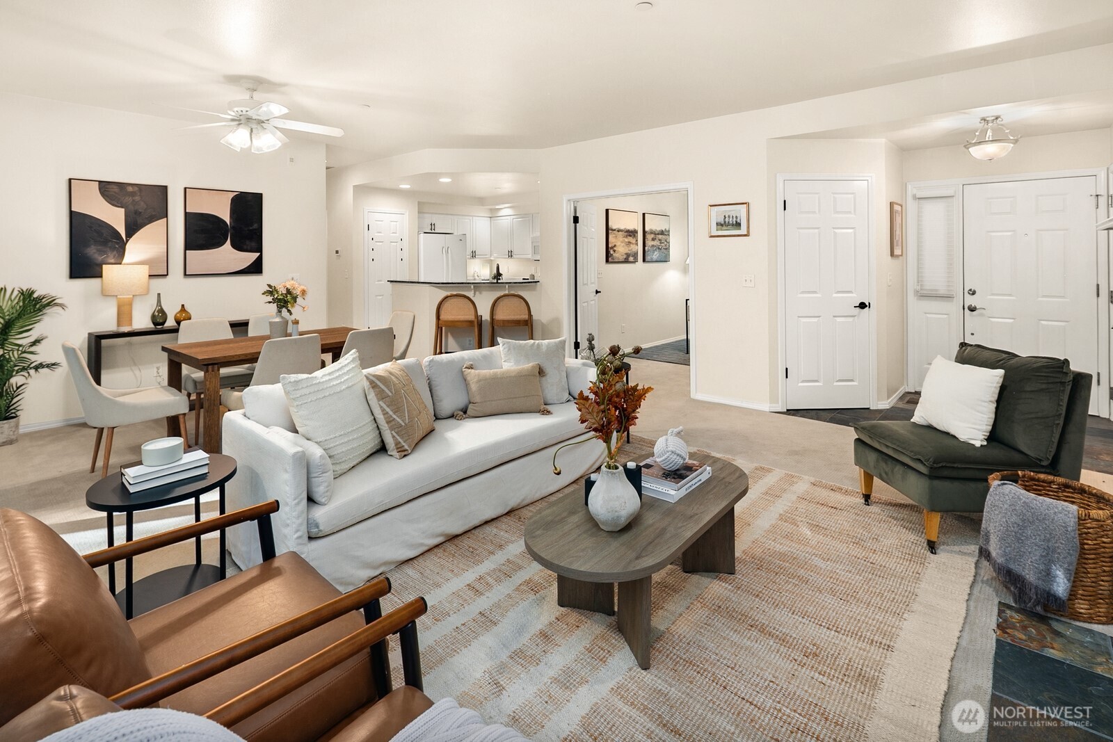 Open living room, dining room, kitchen- opening to private back patio & yard space