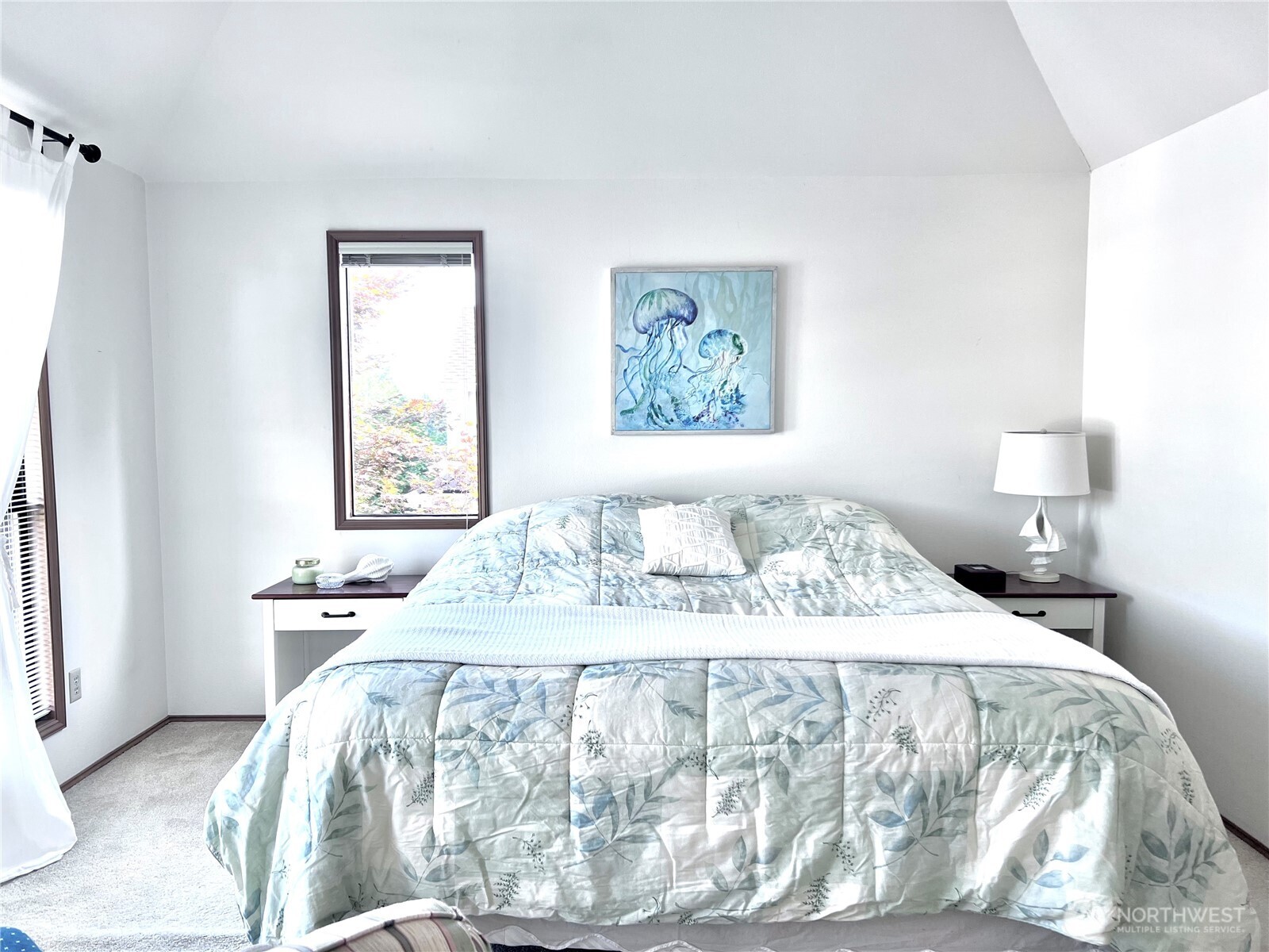 Master bedroom with much light and windows.