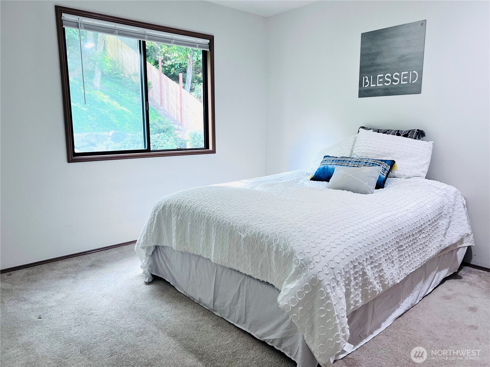 Bedroom 4 quietly located in upper NW corner of home with window facing west and backyard. Large closet for storage.