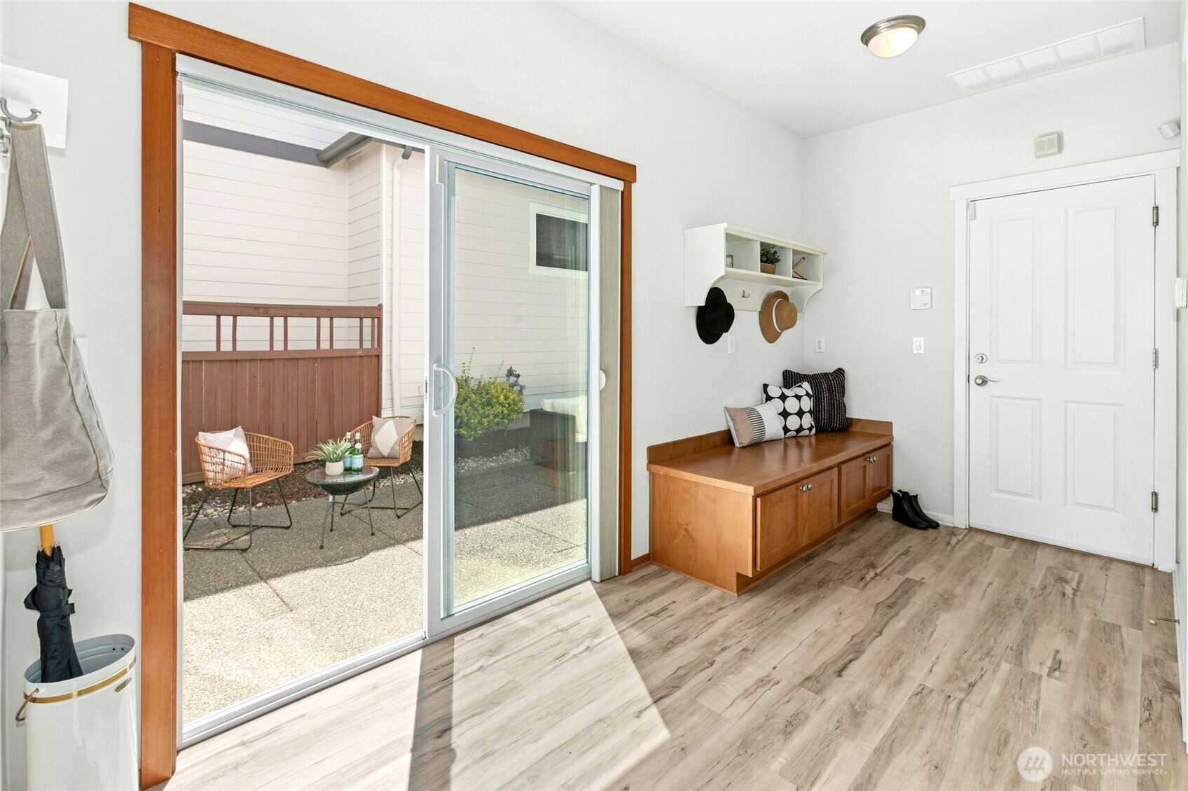 Check out the large mudroom off of the courtyard and garage entry ! A built-in bench with storage and hooks galore make this both beautiful and hard working!