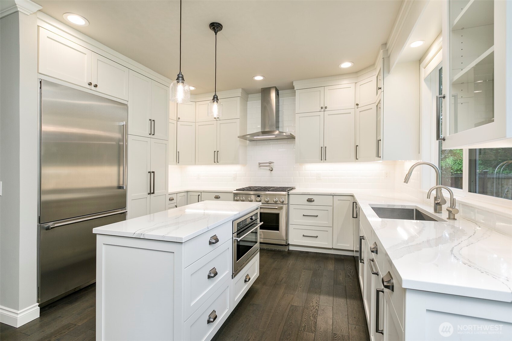 Thermador fridge/freezer, combo convection/microwave 2nd oven; 6-burner dual fuel range oven & Miele dishwasher. Cabinet space for everything