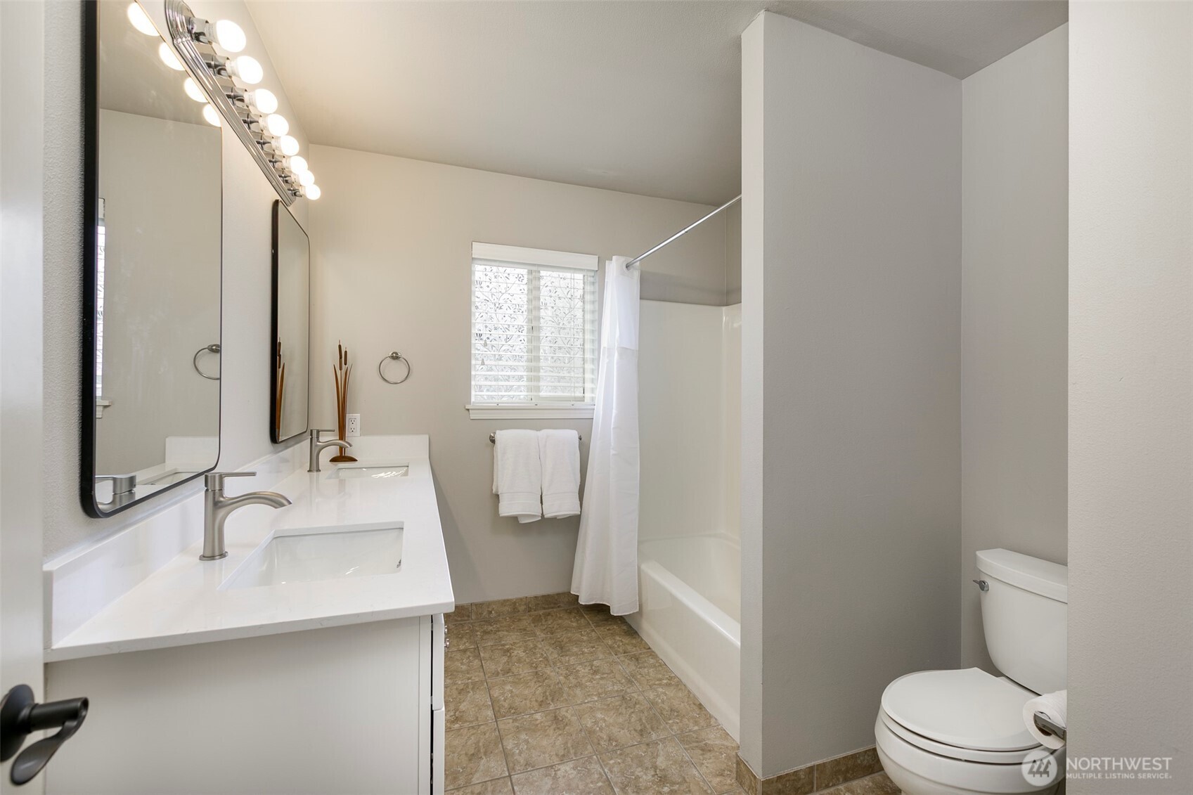 Updated hall bath in upstairs with new trim, counters, faucets & lighting
