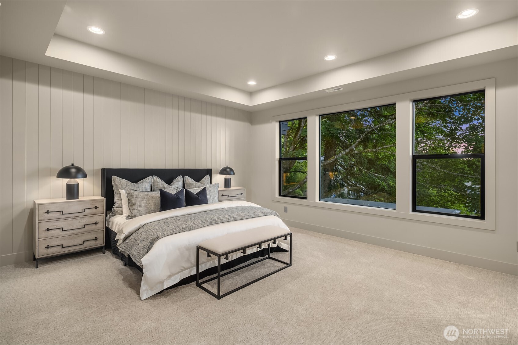 Designer primary suite with five-piece bath