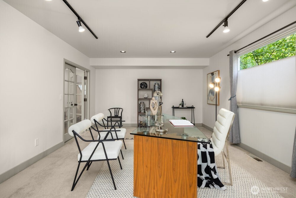Large office close to the front door has a private deck. (1of 3)