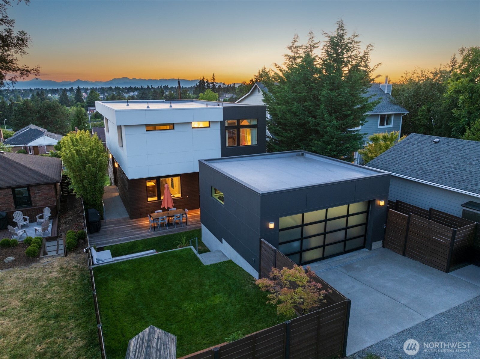 Exceptional East and West facing outdoor spaces + detached EV-ready two-car garage