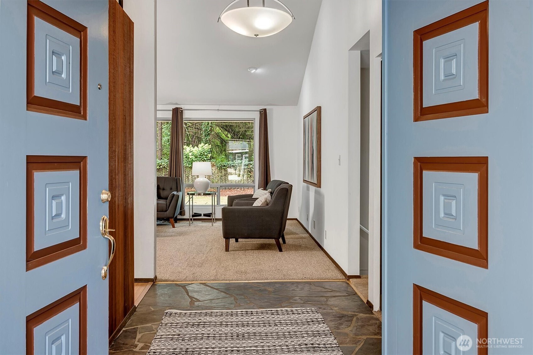 Large entry with slate floors.