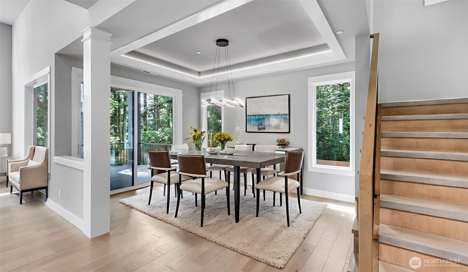 Dining Room with convenient access to the covered patio and peaceful backyard. Virtually staged