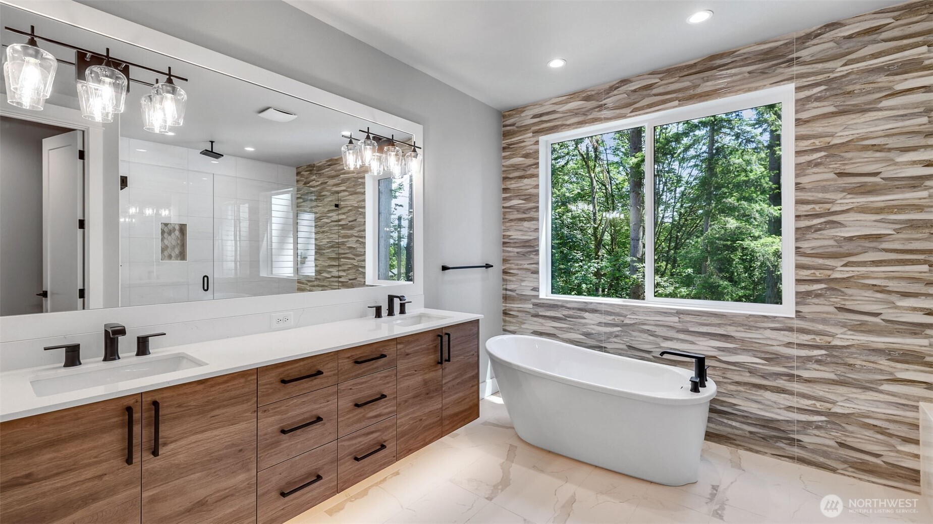 Sumptuous Primary 5-piece Bathroom featuring heated tile floor, floating double-sink vanity, soaking tub and rain shower head (not pictured).