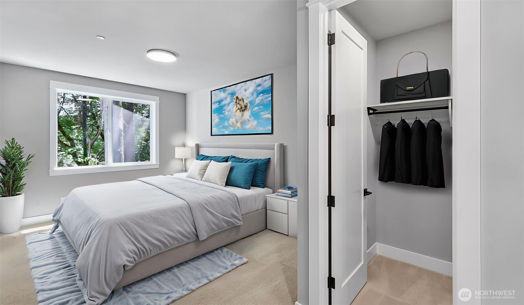 One of the four bedrooms on the Upper Level. Virtually staged