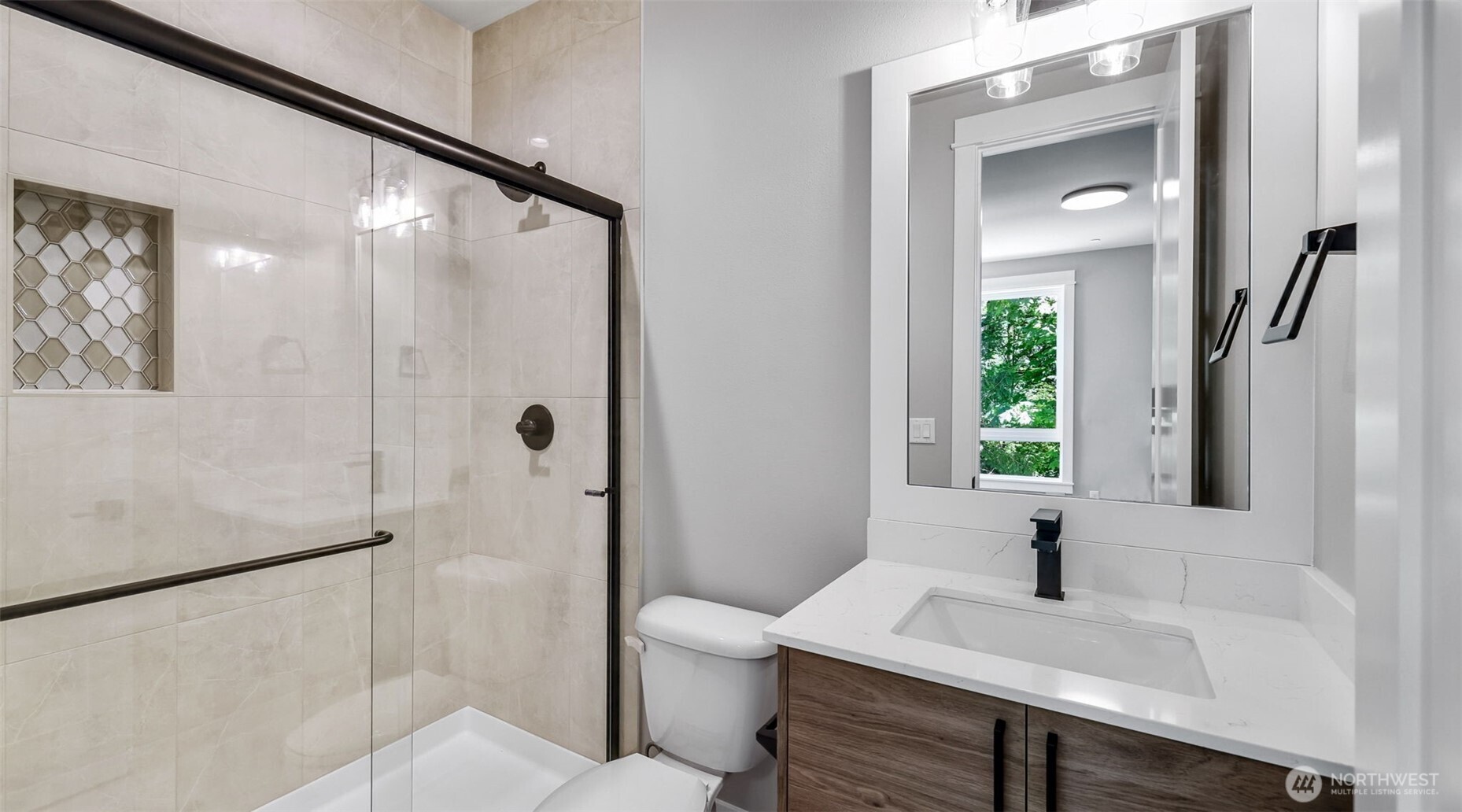 Private bathroom for one of the Upper Level bedrooms