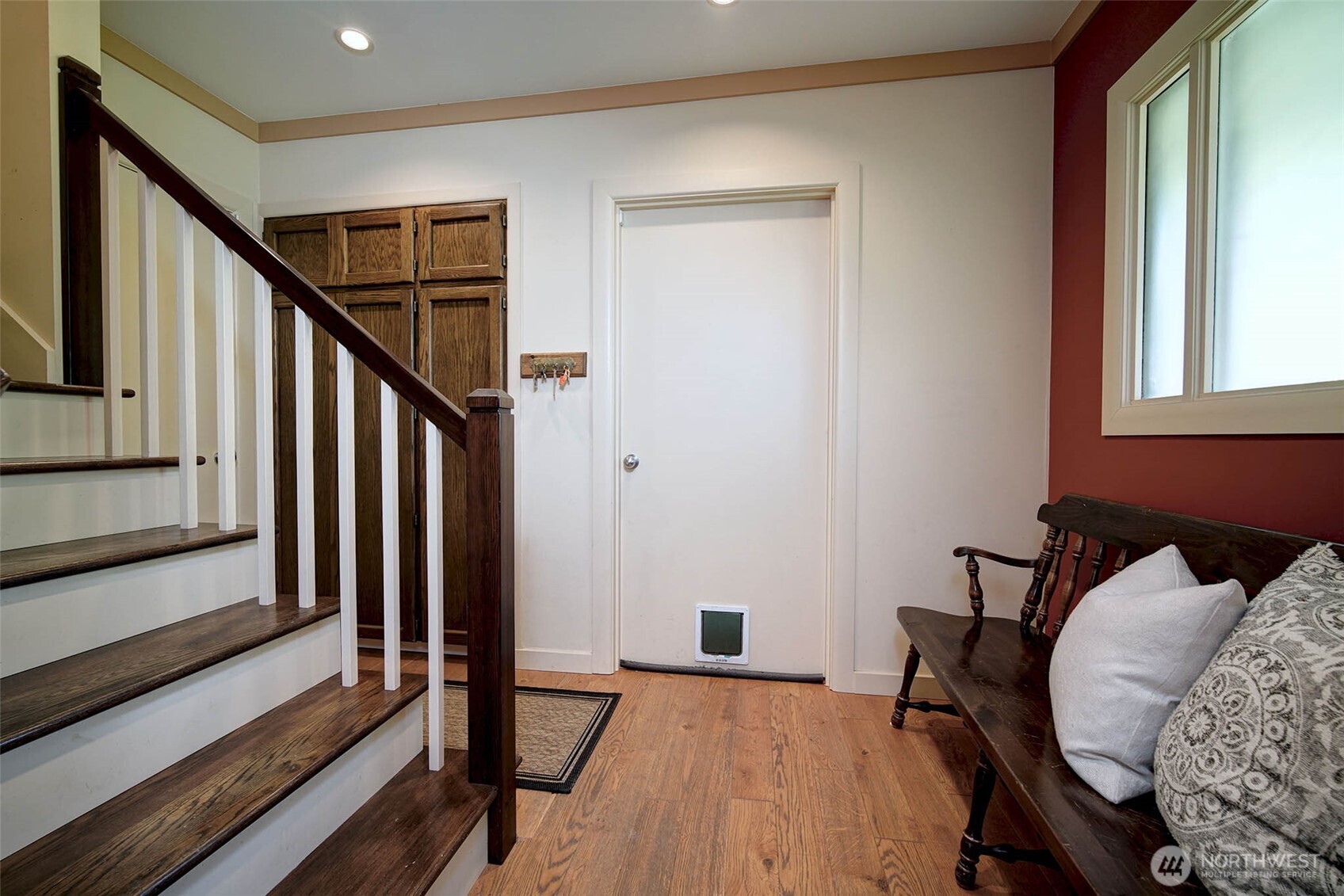 Back staircase leads to Bonus area above the Garage