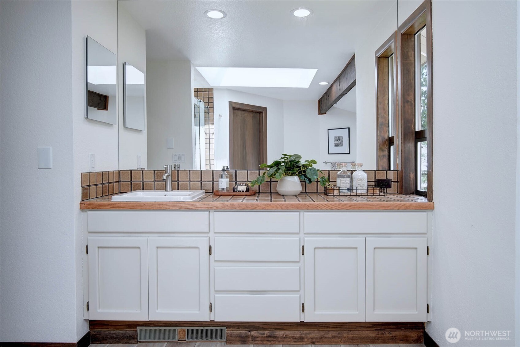 Great Vanity space with plenty of counter to get ready in the morning