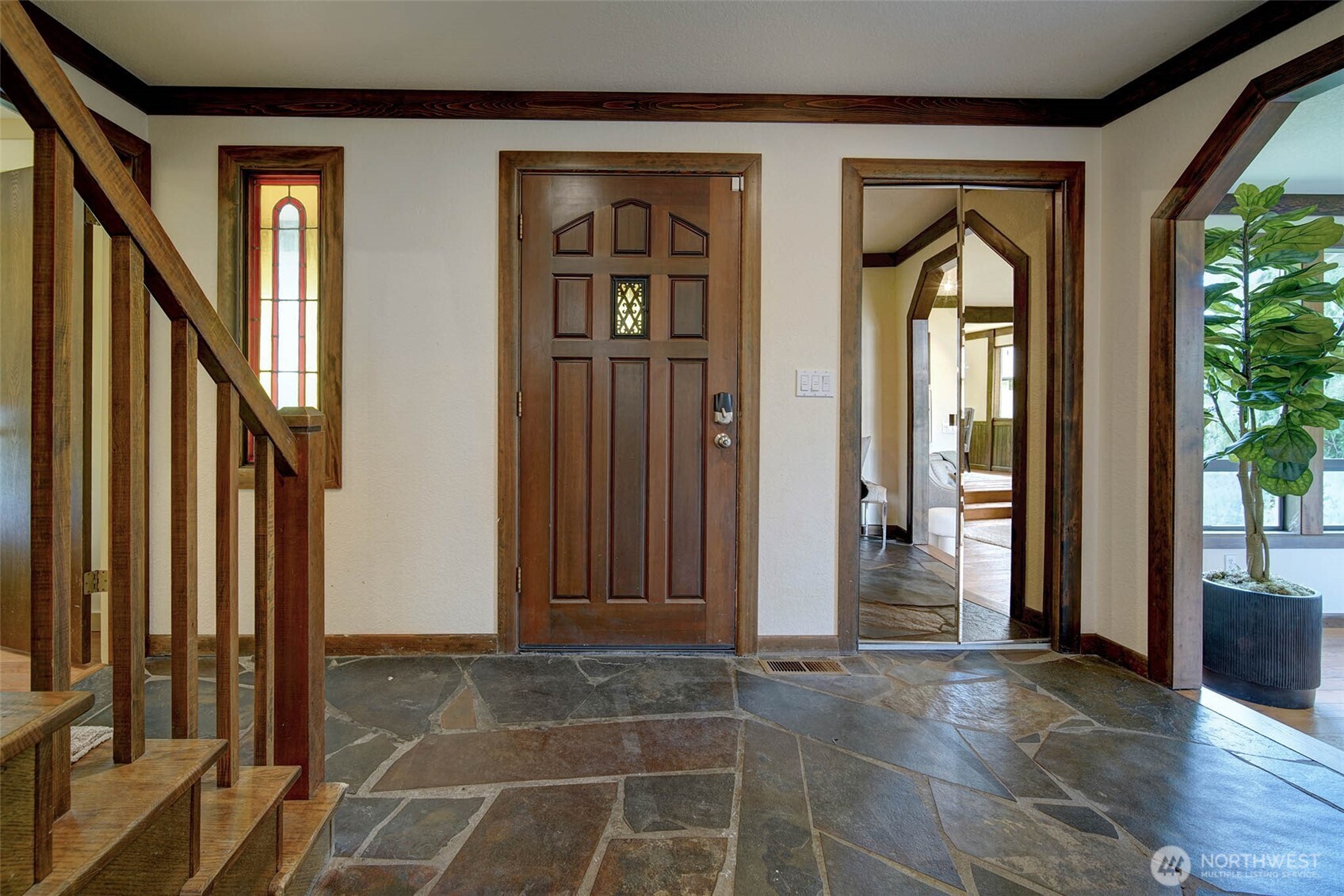 Slate entry sets the stage for the Gracious and spacious Home