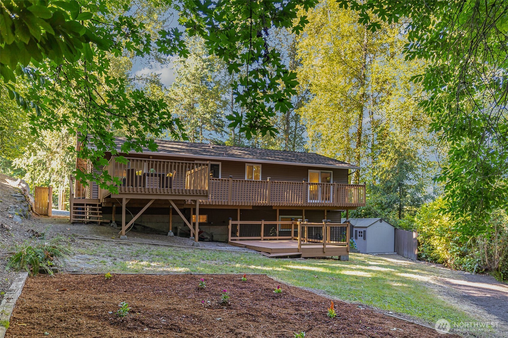 Large backyard with a small creek