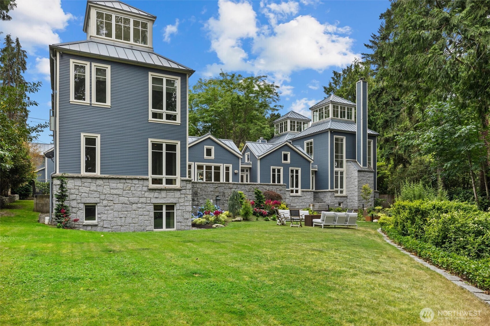 back exterior of 2-story home with daylight basement