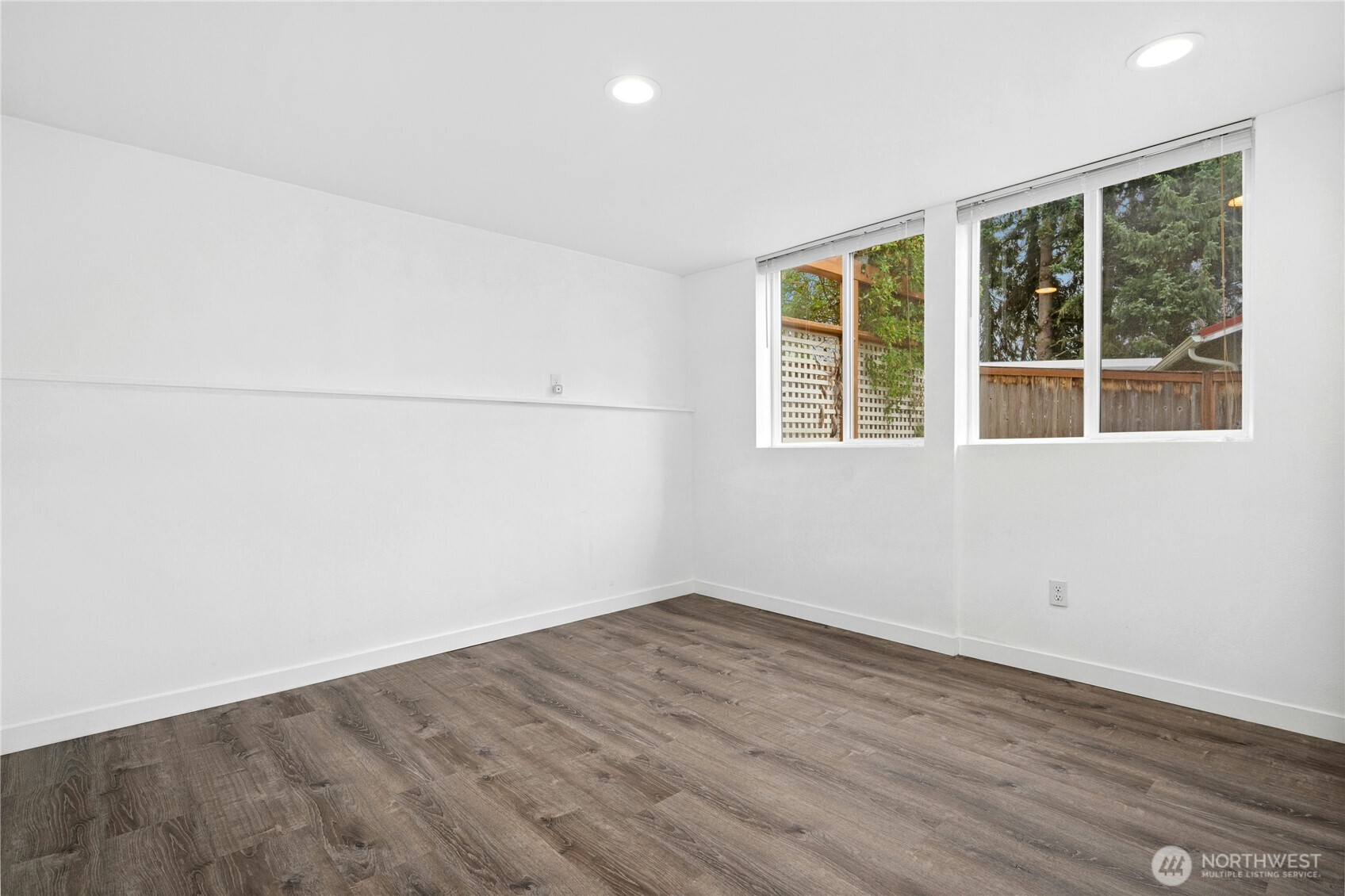Lower-level family room with updated flooring