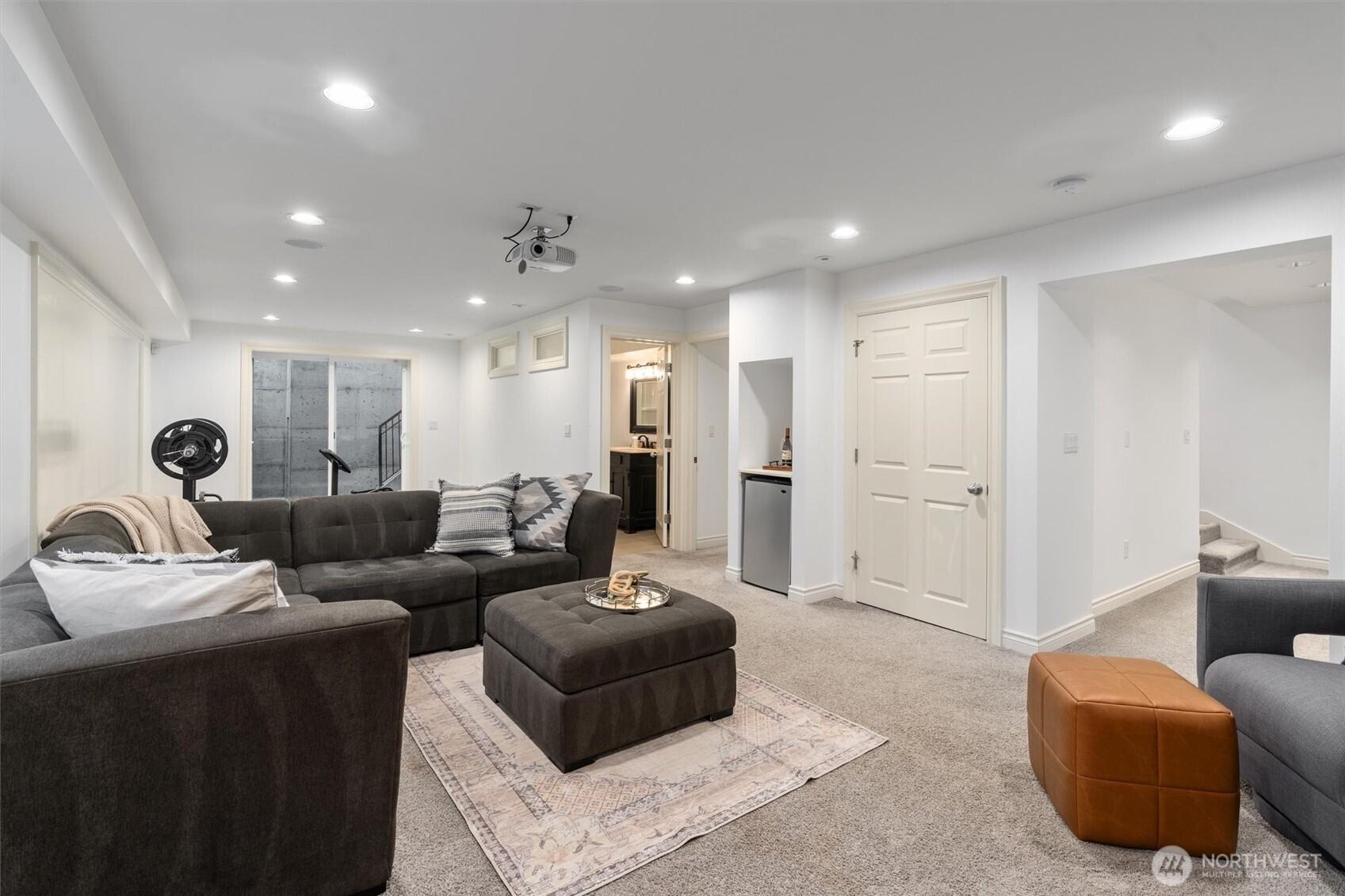 Bonus room with outdoor access and large storage closet—ideal for flexible use or private entry.