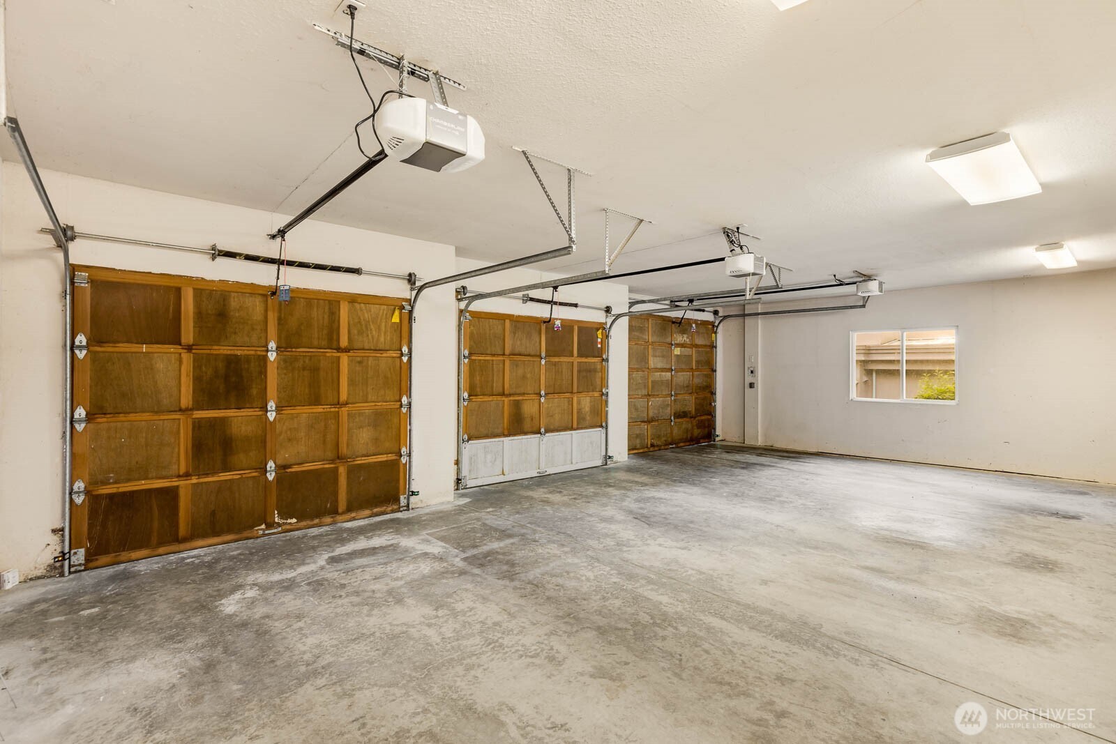 3 Car garage with storage.