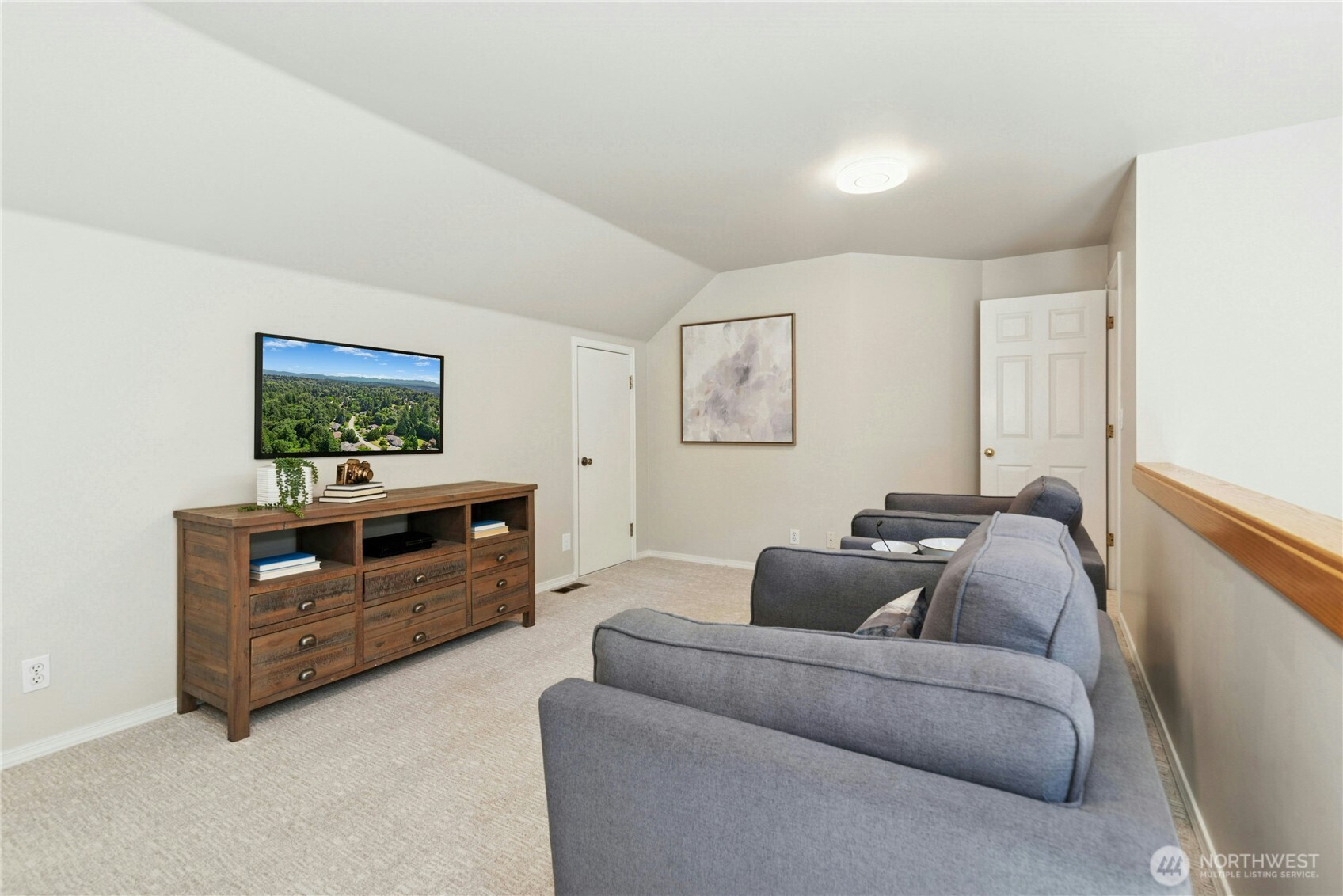 Bonus area above garage with separate stair case on opposite end of home from primary bedroom.