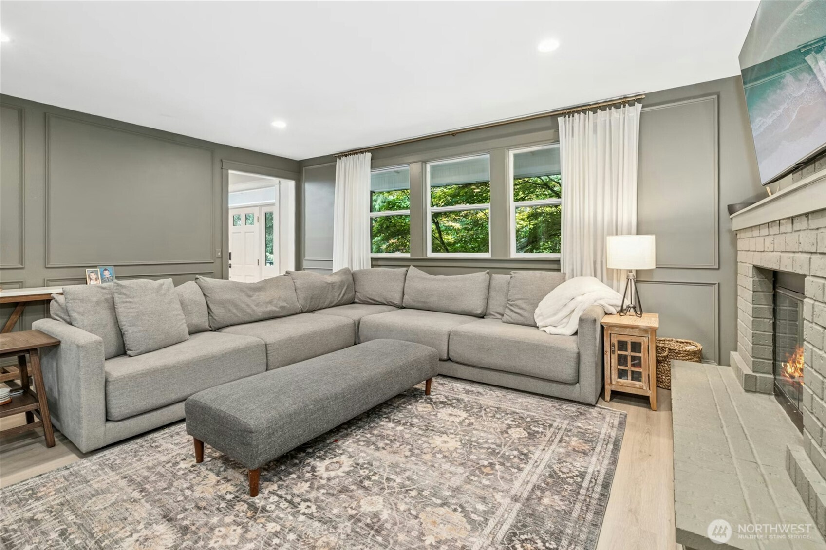 Living room off of the kitchen/dining with gas fireplace