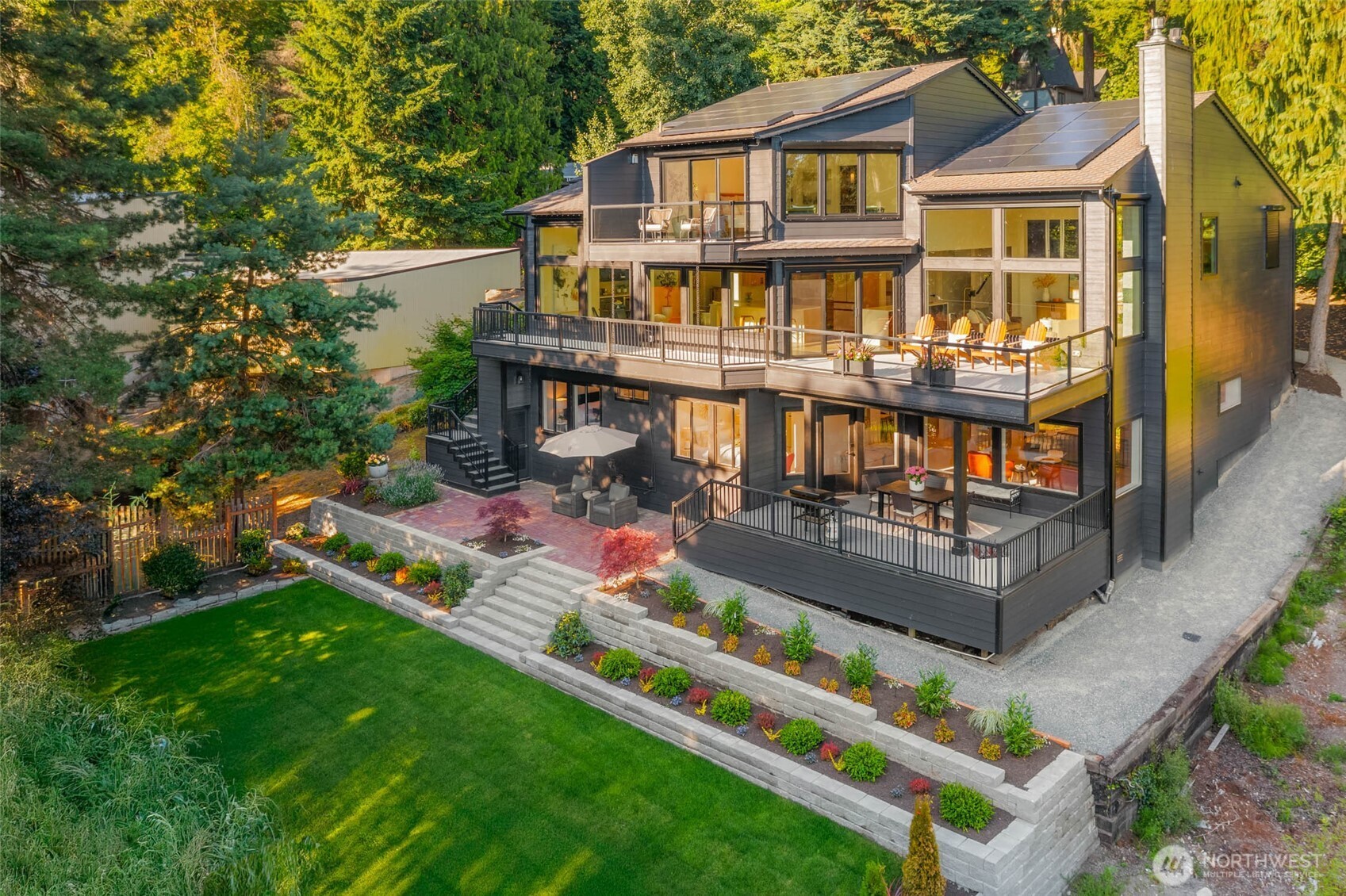 Nothing was left out when updating the exterior of the home as well. Many upgrades include, new plantings & hardscapes, trees, siding, lighting, deck surfaces, and automated exterior blinds (black-out blinds for the bedrooms.)