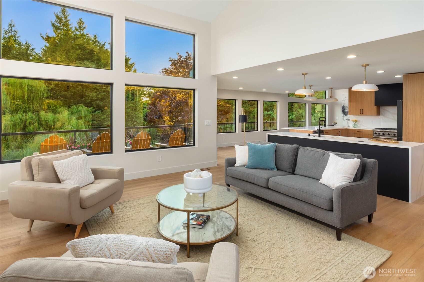 The main level offers bright open spaces including formal living and dining rooms, a fully remodeled kitchen with eating bar & walk-in pantry, and an adjoining spacious family room. You'll also find a guest room, and 3/4 bath!