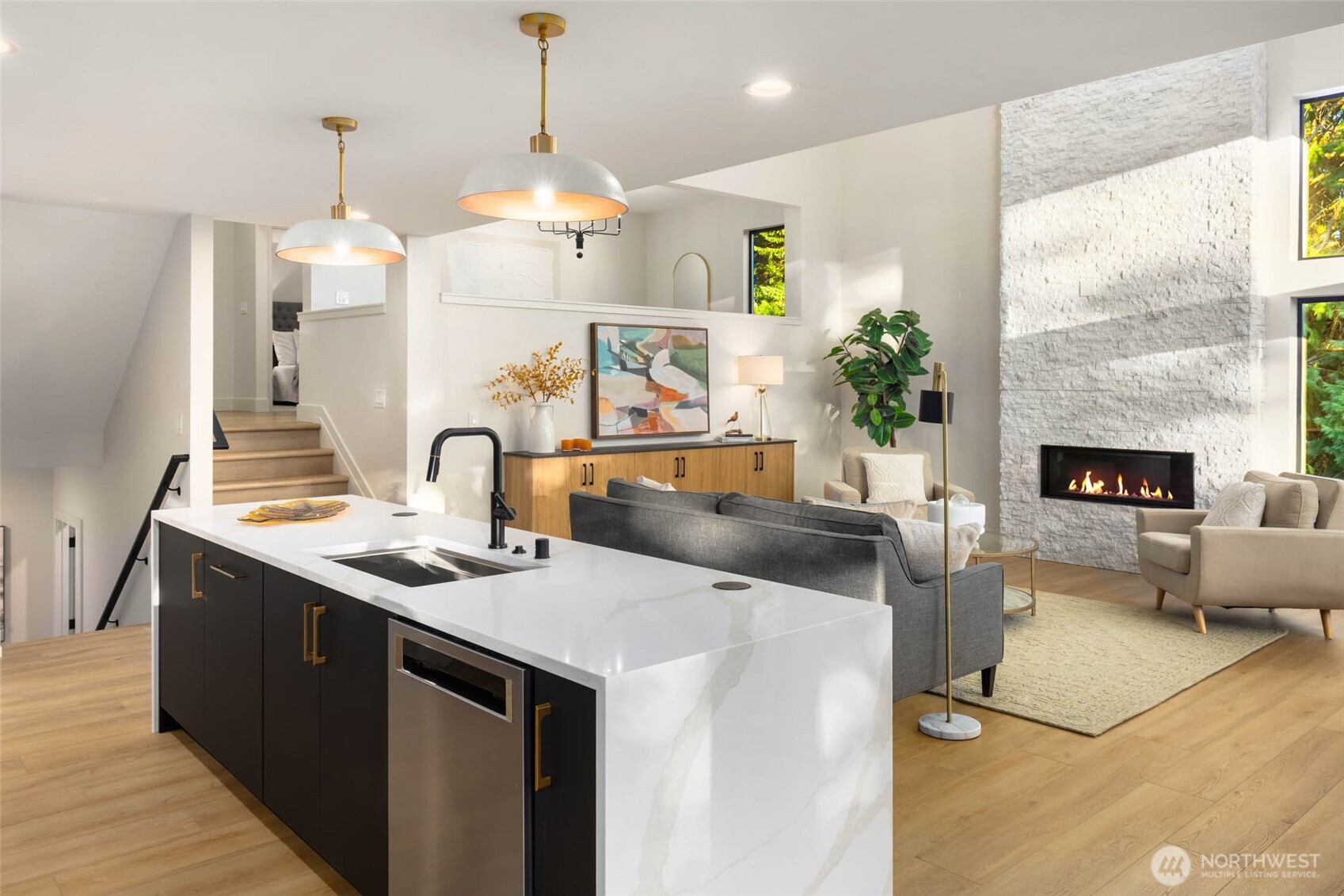 The new two-tone kitchen is stylish as well as highly functional....a gathering space for all to enjoy!