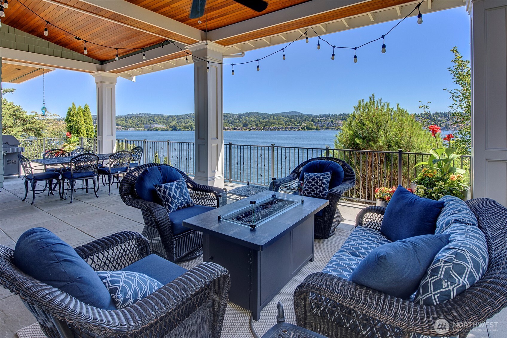 The partially covered deck on the main floor shows of those picturesque views, spanning the length of the east side of the home.