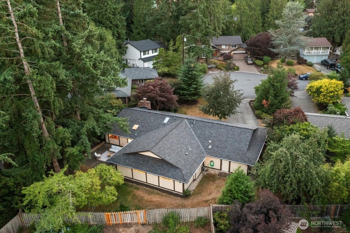 Don't miss walking the full backyard. Large lot with patio and there are fruti trees and garden beds behind the garage