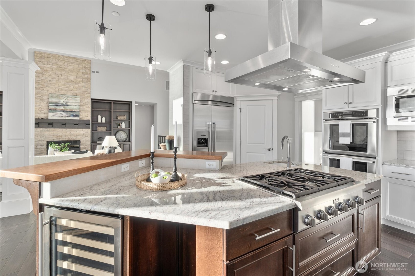 Equipped with premium Thermador appliances, a walk-in pantry, and a built-in wine fridge, this kitchen perfectly balances luxury and functionality.
