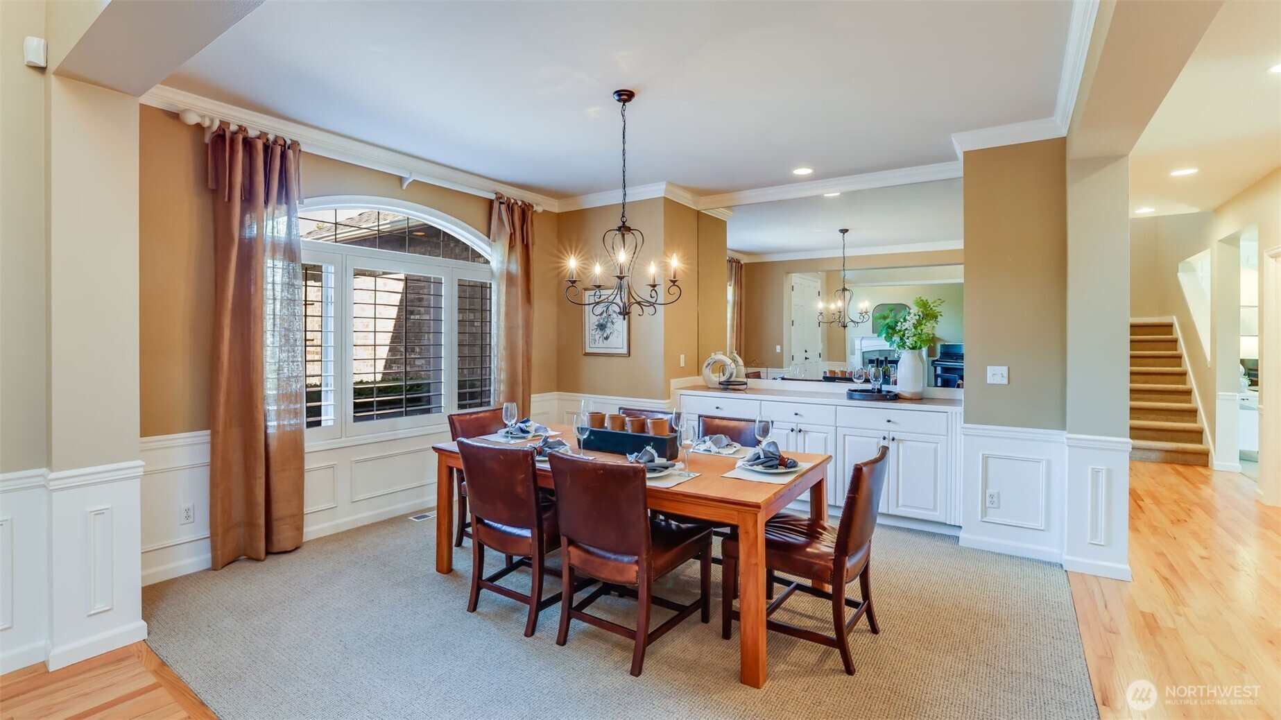 Dining space complete with marble-topped butler's serving area for ease of entertaining