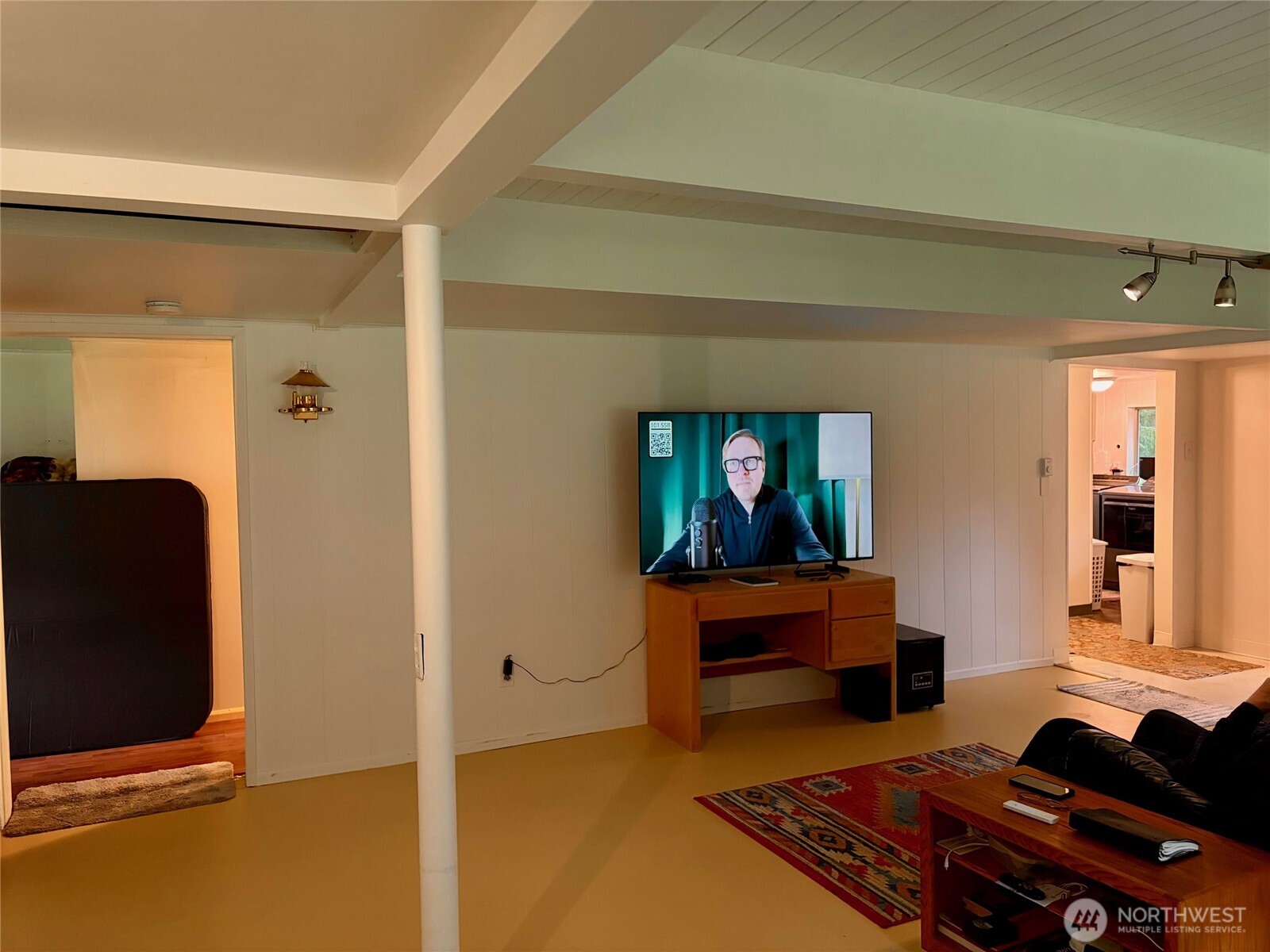 View from Far Wall of Living Room Towards Kitchen