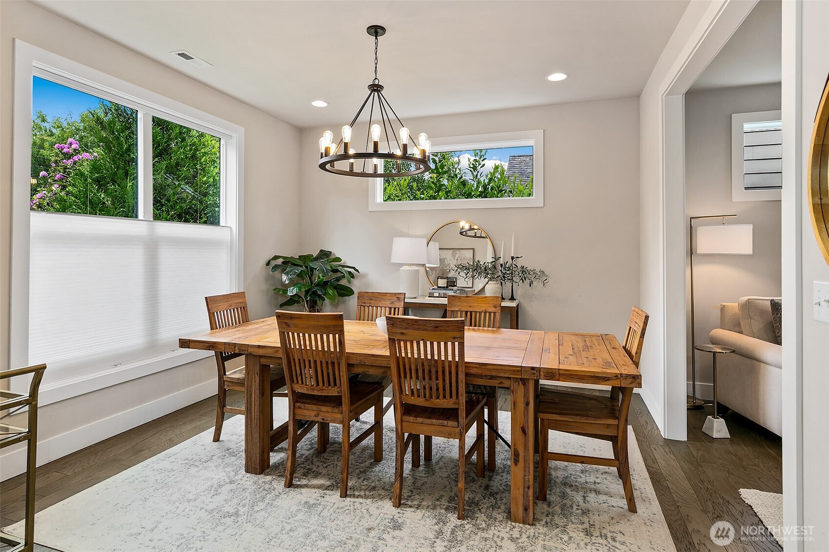 All of the windows look out to lush greenery.