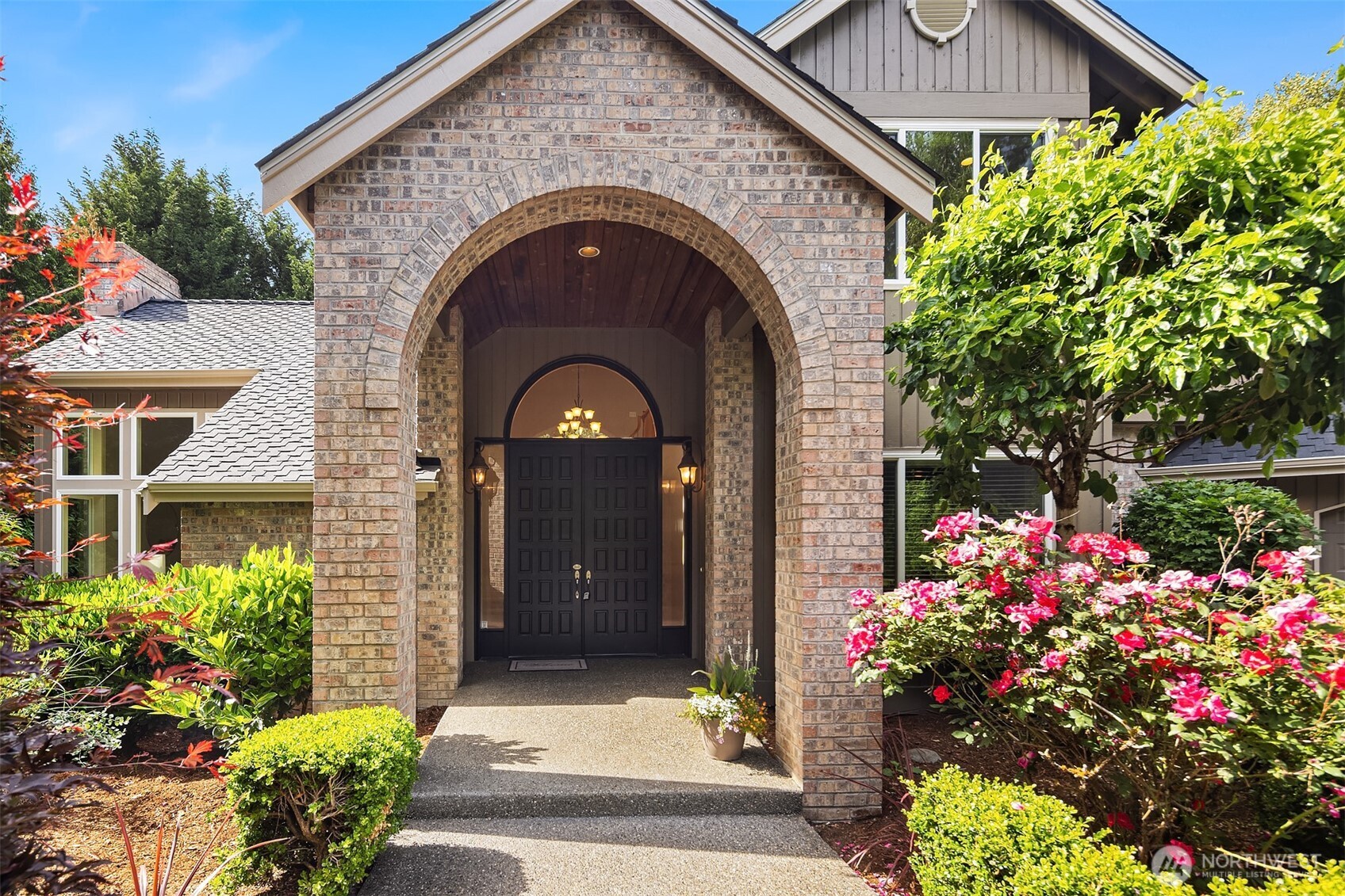 Grand entrance with covered front porch.