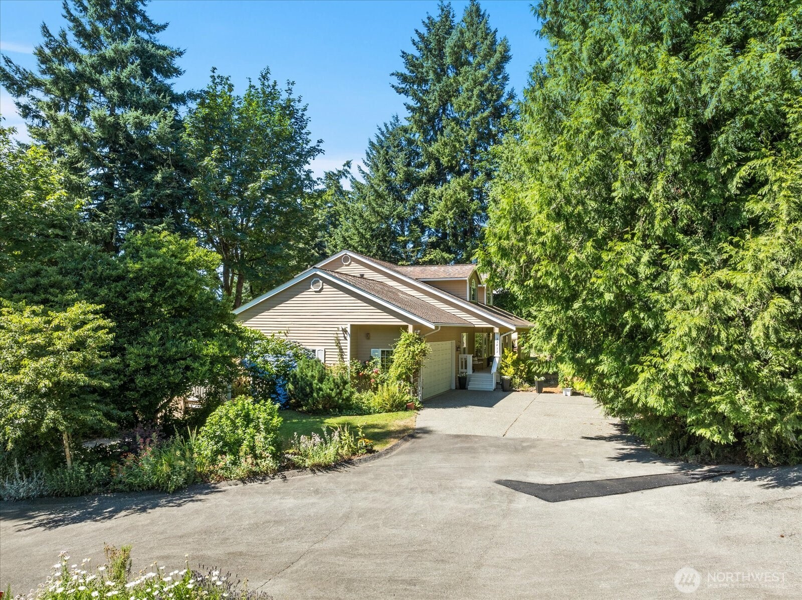 Set in a private, beautifully treed setting, this property offers peace, seclusion, and a strong connection to nature.
