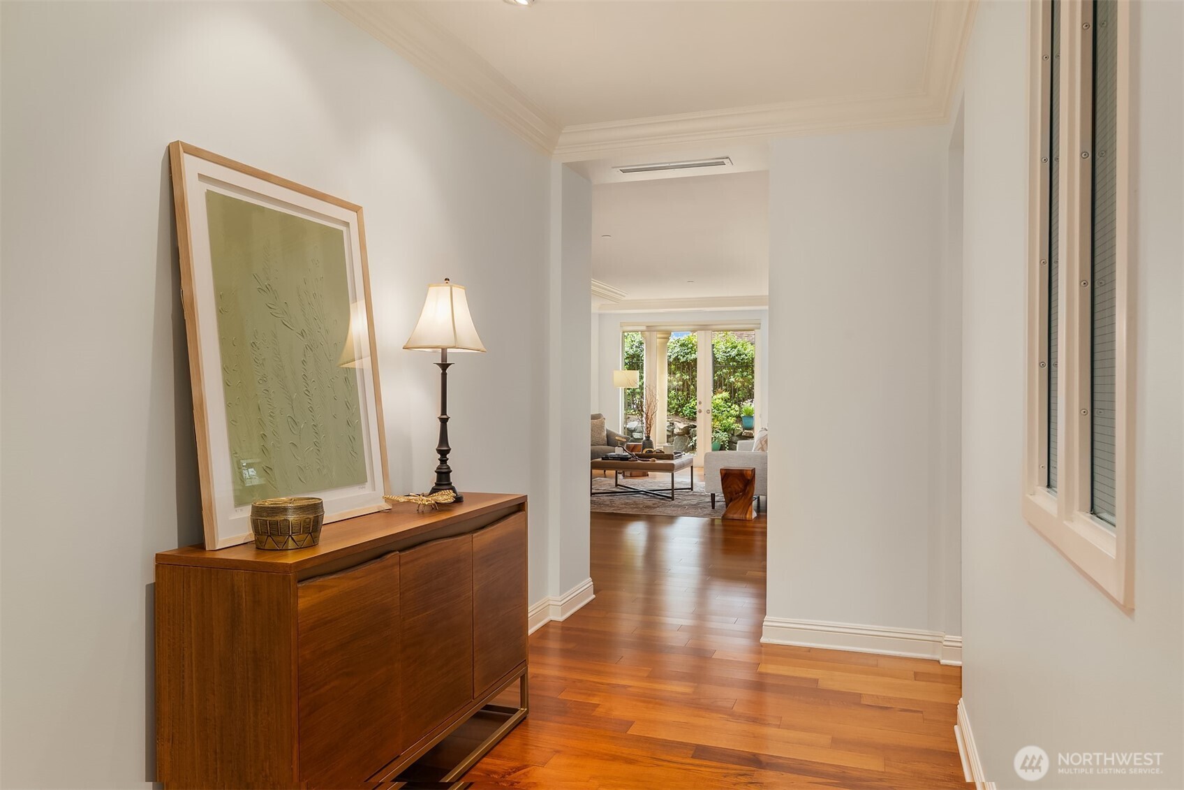 Rich warm woods greet you in the spacious foyer.