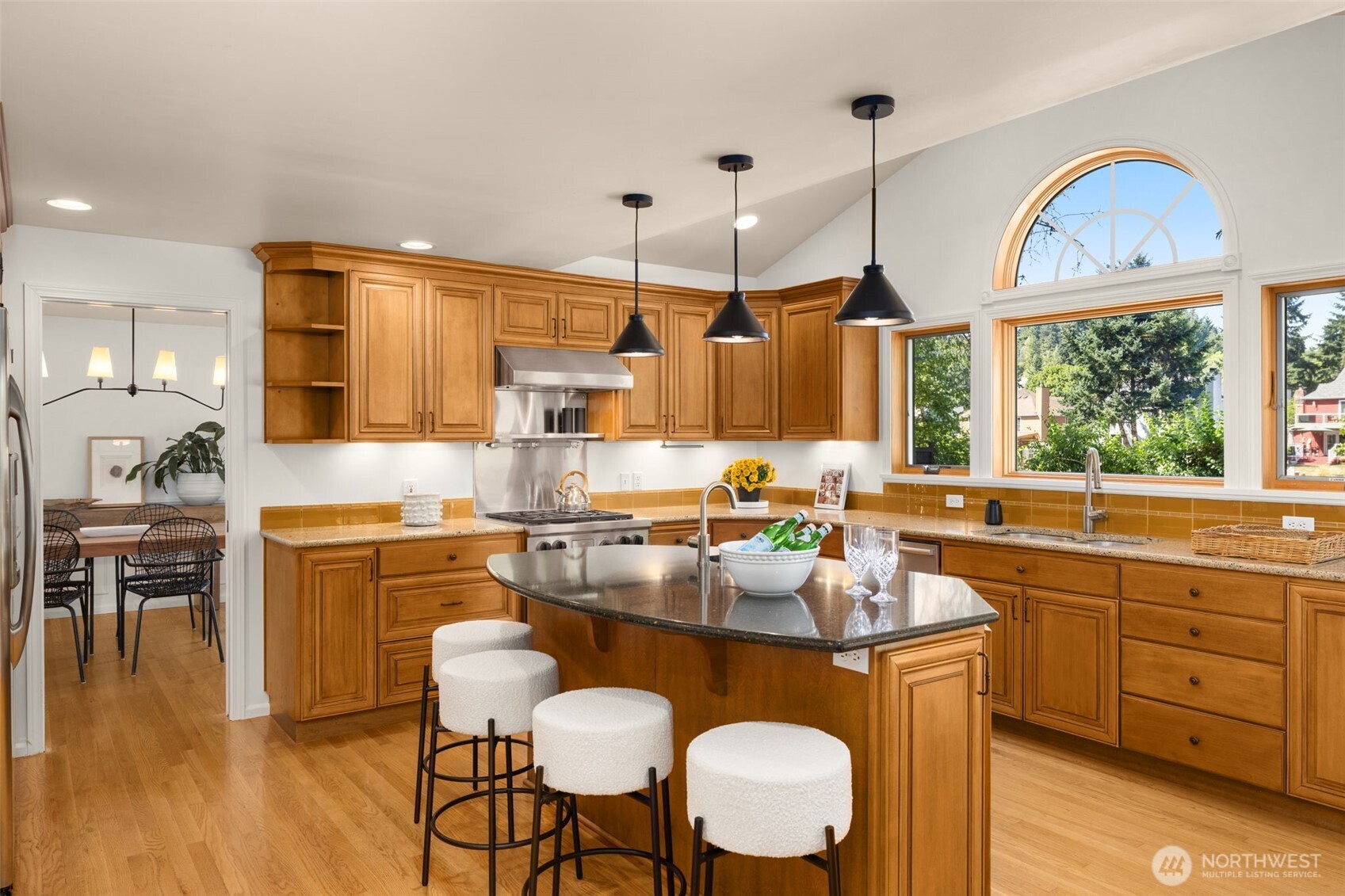 Start your day at the kitchen bar, where morning coffee and casual bites come with sunshine and river breezes.